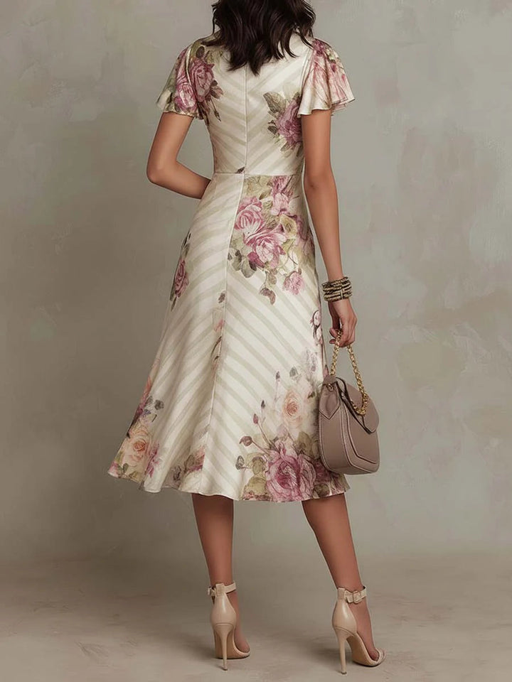 Alba | Elegant retroblommig midiklänning i satin