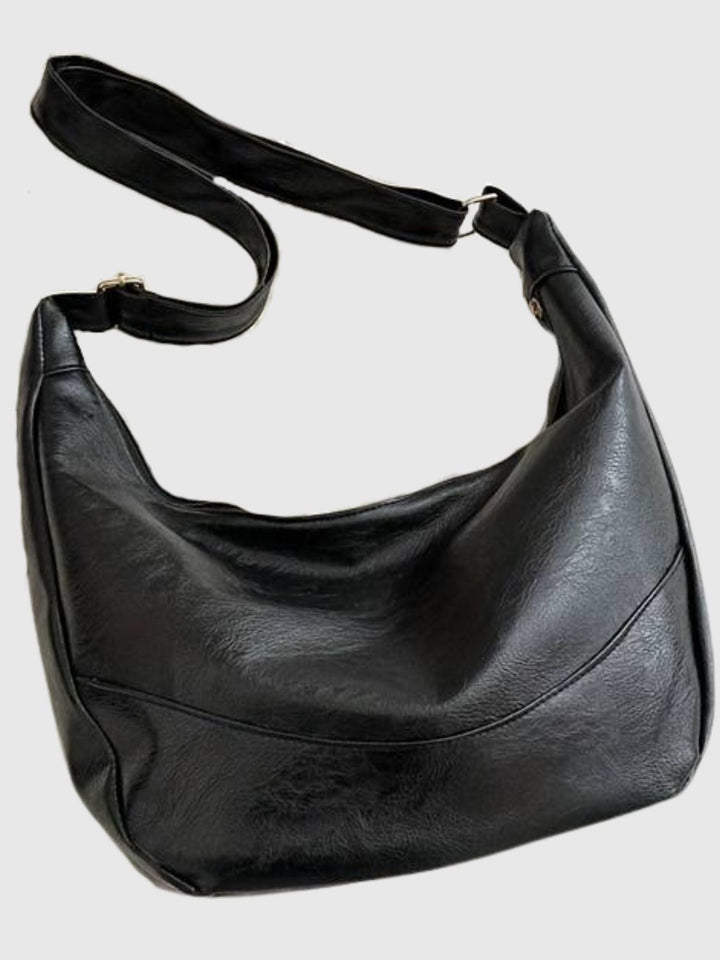 Clementine Sleek Sling-väska