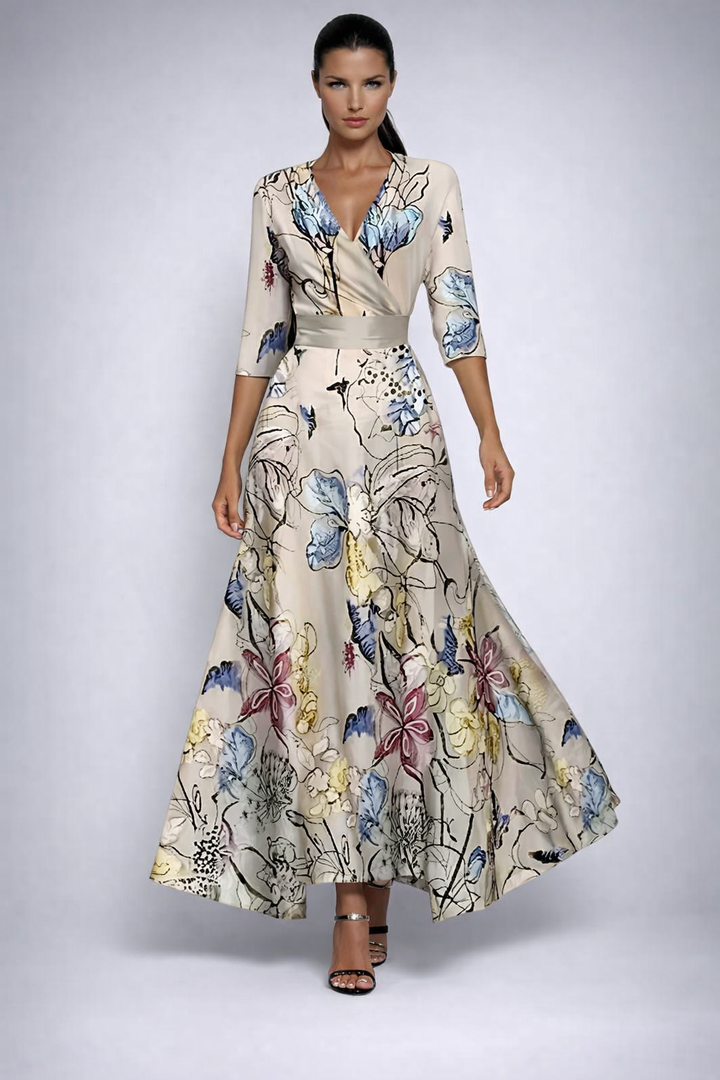 Elisa - Elegant omlottmaxiklänning med blommor